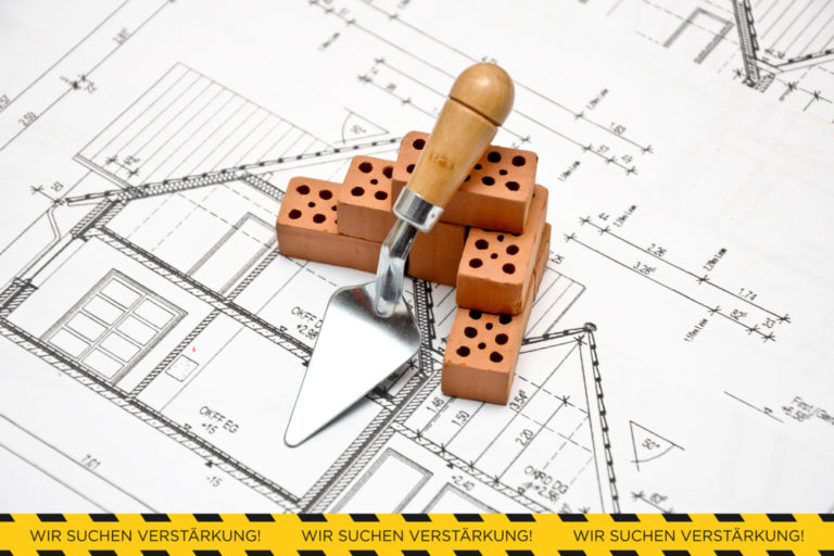 Yellow sign on fence saying: Entering the property prohibited. P